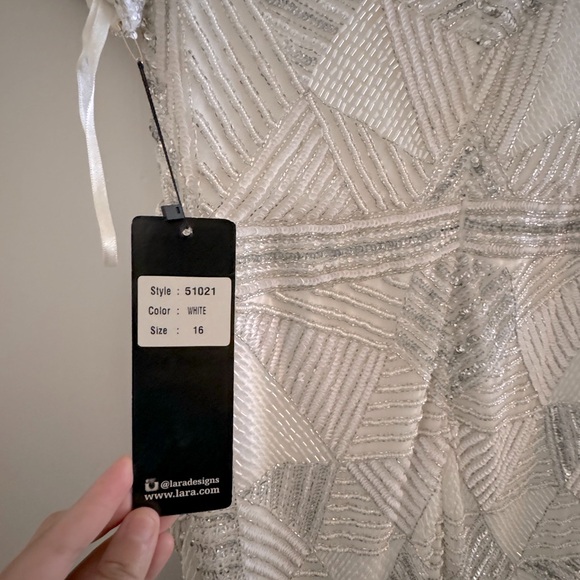 LARA Designs size 16. Dress is white sequined w/white and silver sequins. - Picture 4 of 5